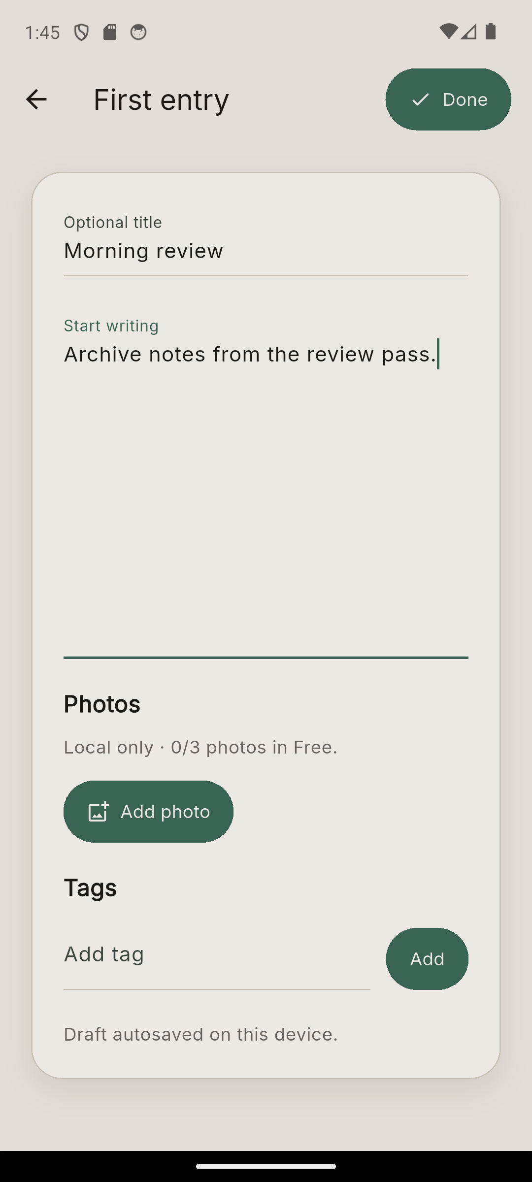 DayKept new entry editor showing writing in progress, the Photos section and Add photo.